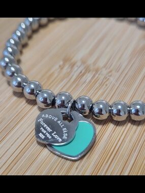 18 K GP Beaded Bracelet with Mint Heart Charm.Strech